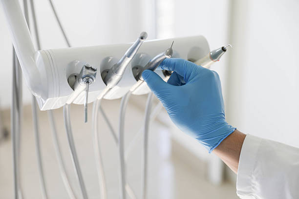Professional Root Canal Treatment technician working in Madisonville, TX